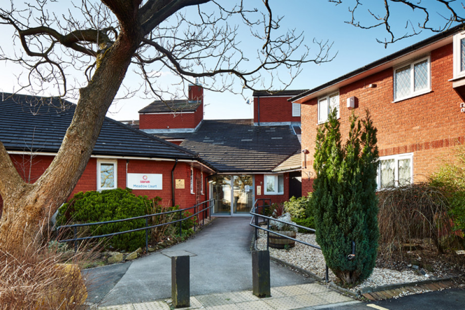 Photo showing the front entrance of a housing scheme