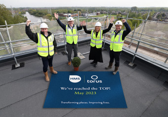 HMS and Torus colleagues celebrate the completion of the renovations to the roof at Kingsway house