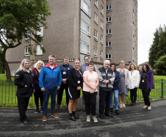 Torus colleagues stand with tenants outside Kingsweay house during the consultation on renovation works