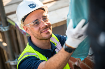 Photo of a HMS operative working on a building site