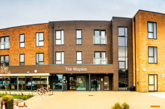 Photo showing the front of The Maples