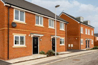 Photo showing a row of newly built houses